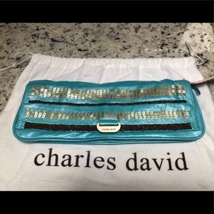 Charles David blue and sequin clutch